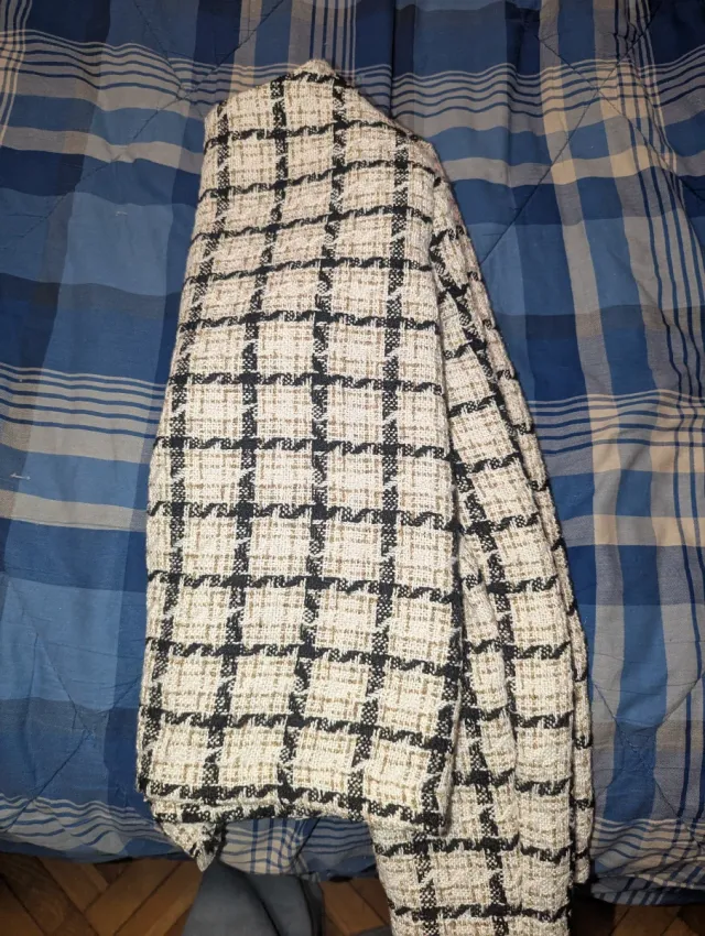 Maglione a quadri bianca e nera