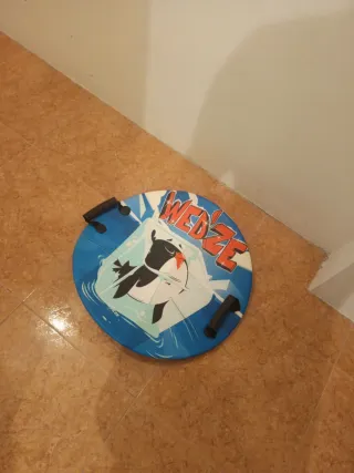 Trineo redondo con asas