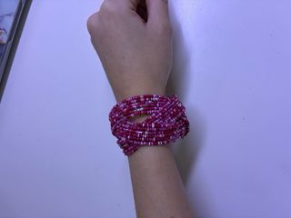 Braccialetto rigido perline rosa