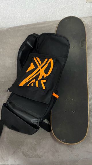 Skate con mochila y protecciones RUNFIT