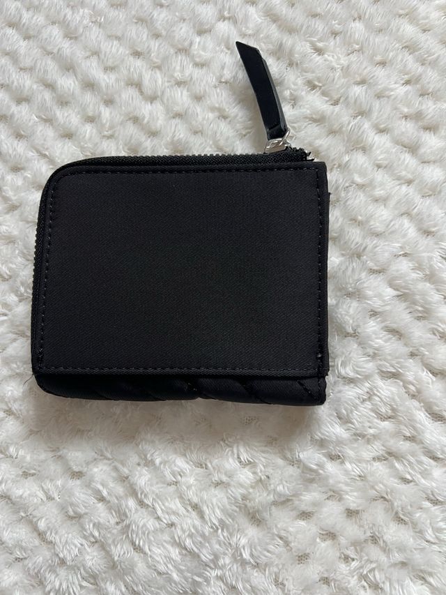 Monedero negro acolchado