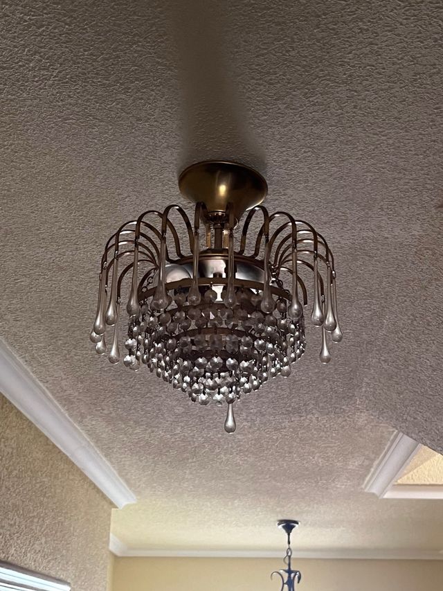 Lámpara colgante de cristal y metal