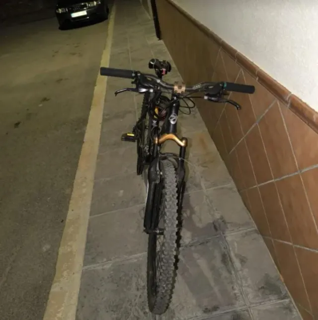 Bicicleta de Montaña en negra y dorada