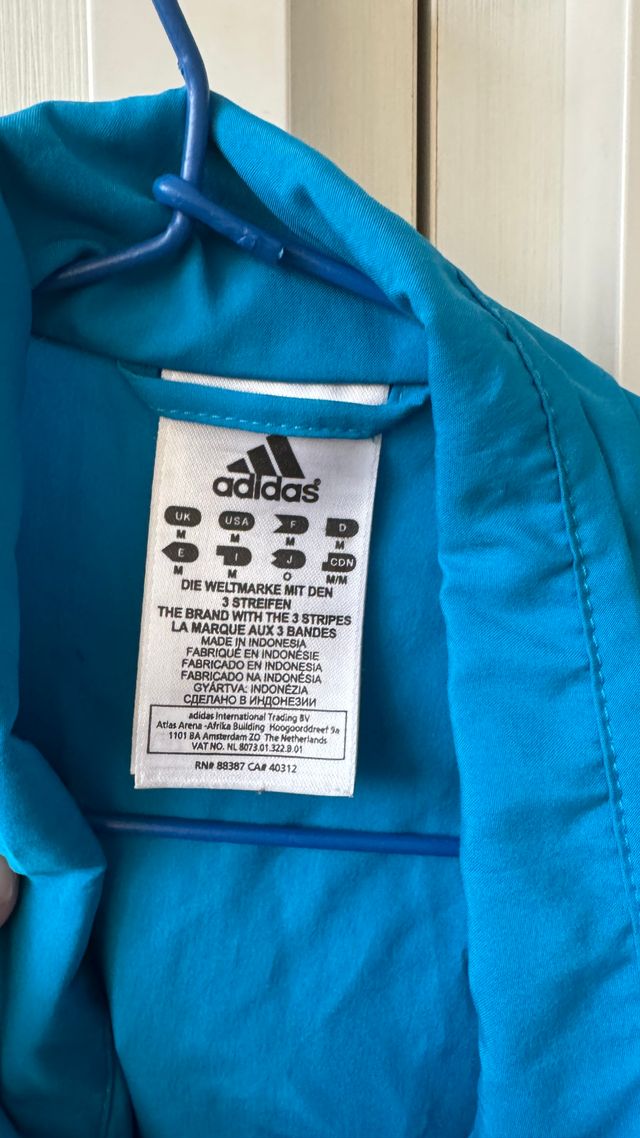 Cortavientos Adidas Azul y Amarillo Running