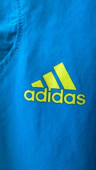 Cortavientos Adidas Azul y Amarillo Running