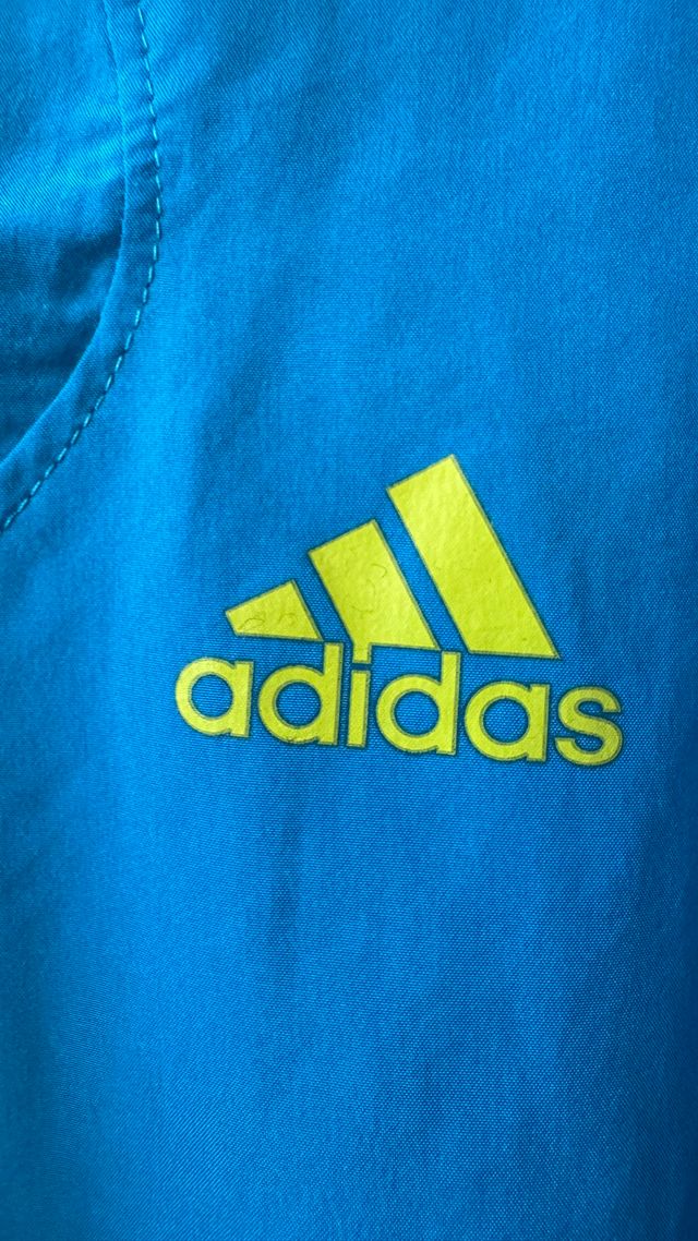 Cortavientos Adidas Azul y Amarillo Running