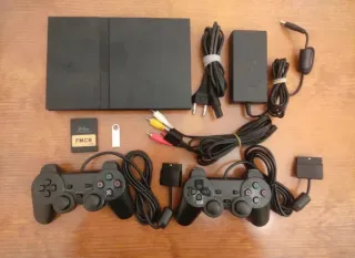 PS2 Slim Negra + 2 Mandos + Tarjeta Memoria 64MB