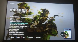 PS2 Slim Negra + 2 Mandos + Tarjeta Memoria 64MB