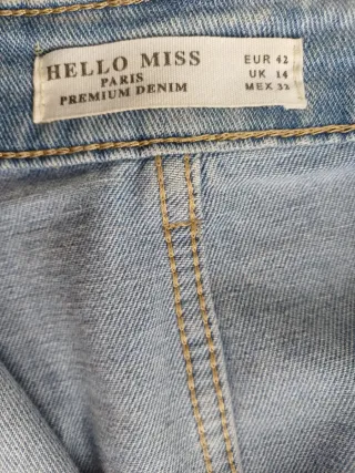 Falda vaquera azul claro midi desgastada