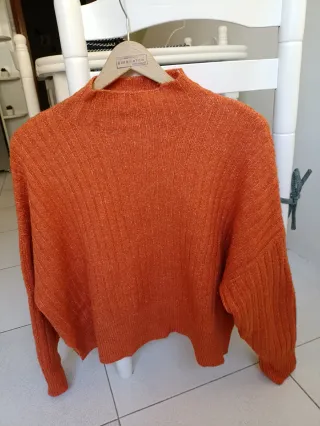 Jersey naranja cuello alto