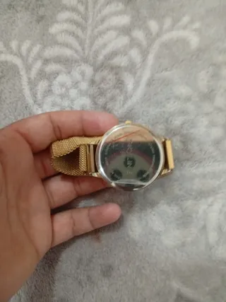 Reloj SKYLINE dorado y blanco