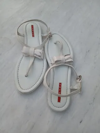 Sandali infradito Prada in pelle bianchi