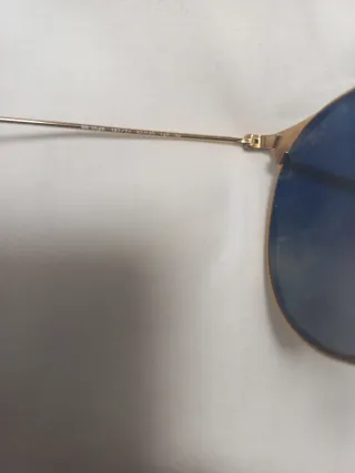 Gafas de sol mujer Ray-Ban negras y doradas