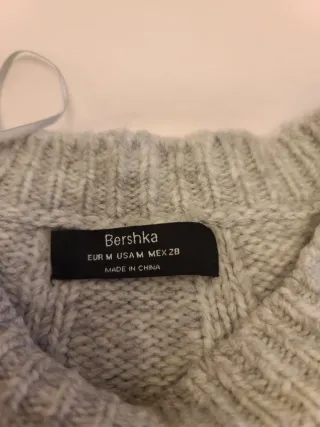 Jersey de lana gris desgastado