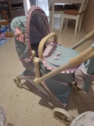 Carrito de muñecas azul y rosa
