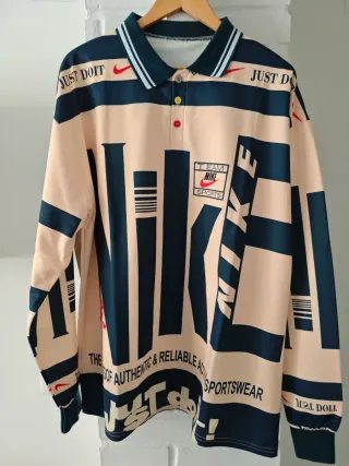 Polo Nike manga larga beige y azul