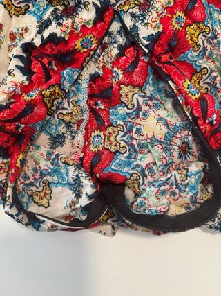 Mono estampado con flecos