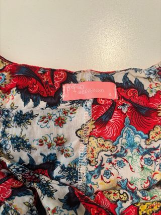 Mono estampado con flecos