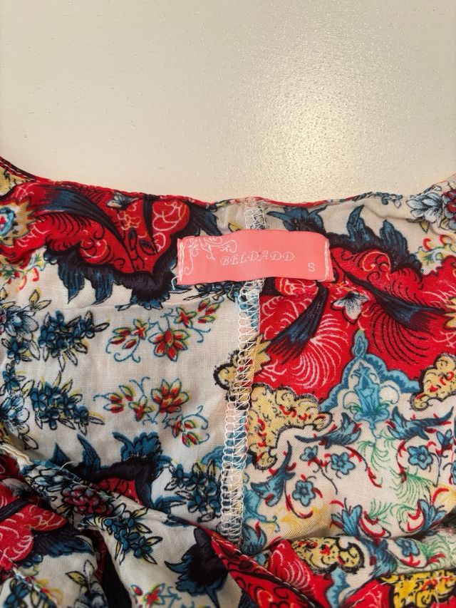 Mono estampado con flecos