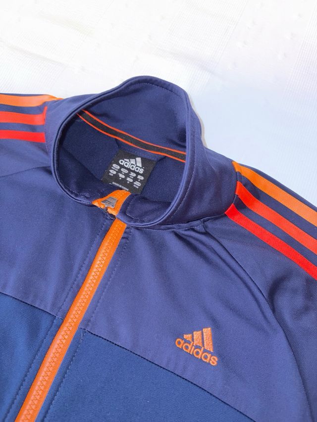Chándal Adidas azul y naranja