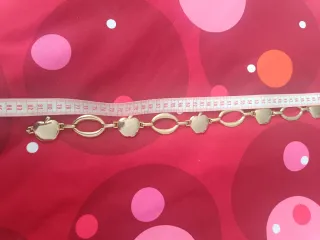 Cinturón vintage dorado con manzanas