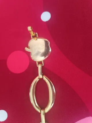 Cinturón vintage dorado con manzanas