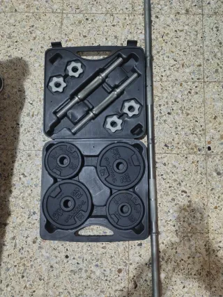 Pesas gimnasio con barra y maletín