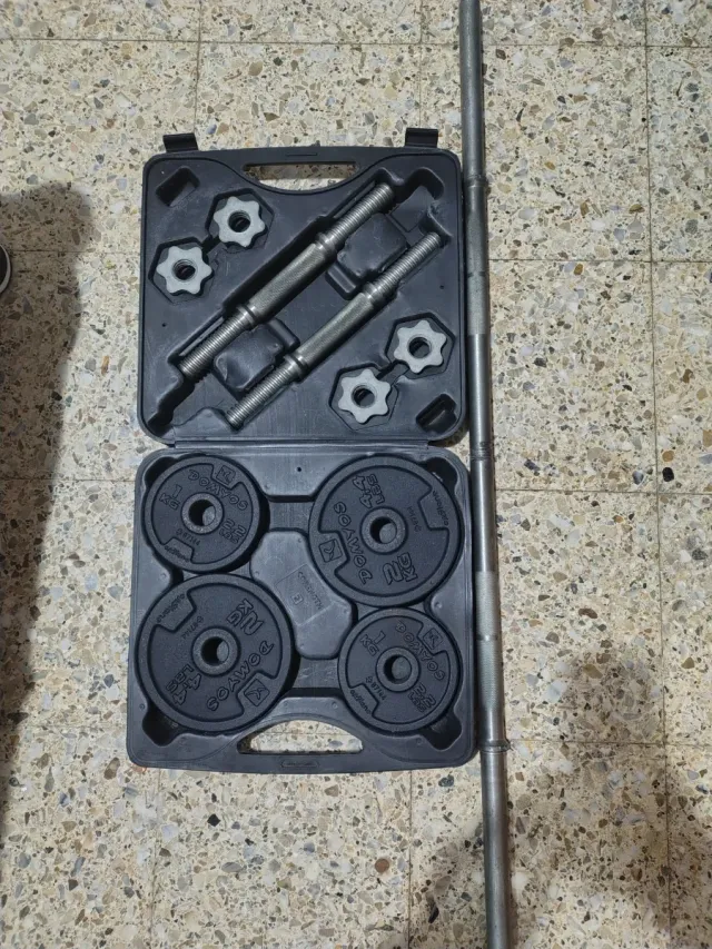 Pesas gimnasio con barra y maletín