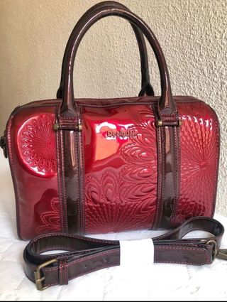 Bolso Desigual brillante rojo y marrón