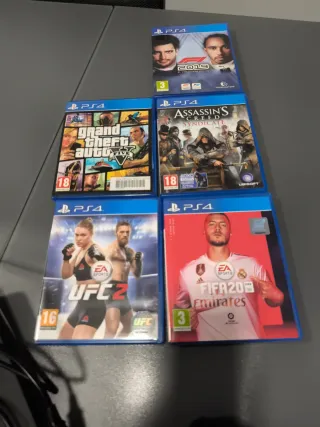 PS4 (PlayStation 4) + 5 Juegos y 2 mandos