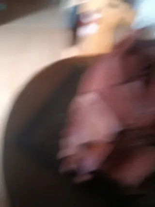 Mochila de cuero marrón y multicolor