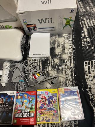 Nintendo Wii + Wii Fit Plus + 7 Juegos