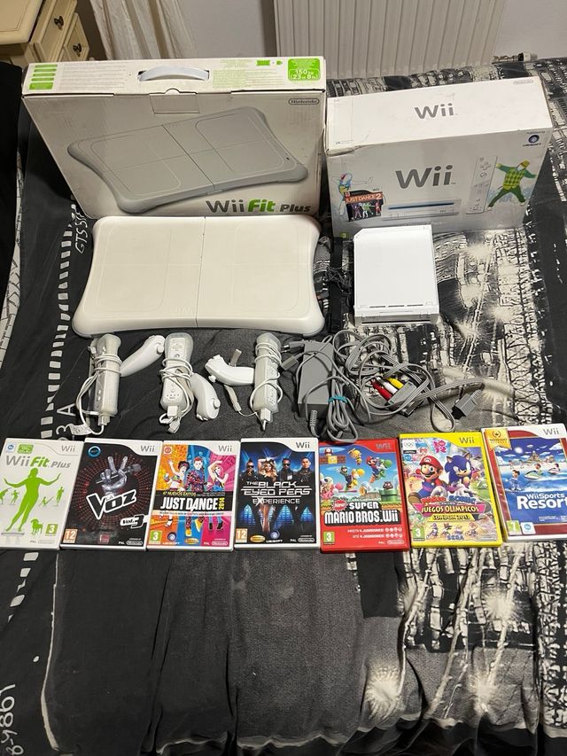 Nintendo Wii + Wii Fit Plus + 7 Juegos