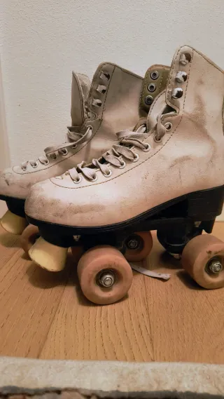 Pattini a 4 rotelle bianchi