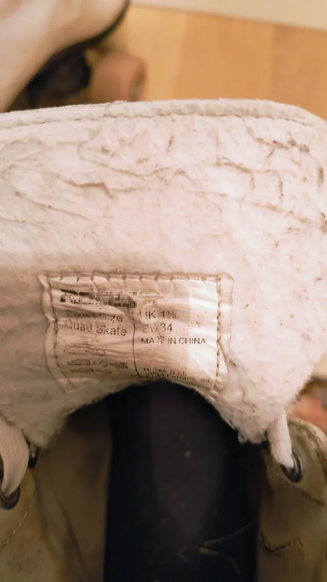 Pattini a 4 rotelle bianchi