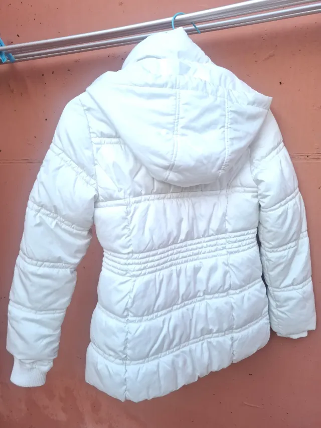 Plumífero niña blanco