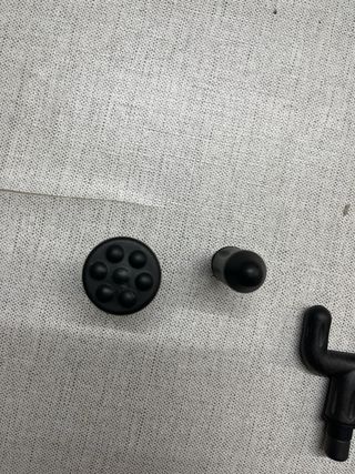 Pistola Masajeador Muscular Negra y Dorada