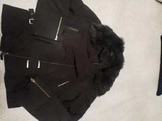 Chaqueta negra mujer plumas con pelo