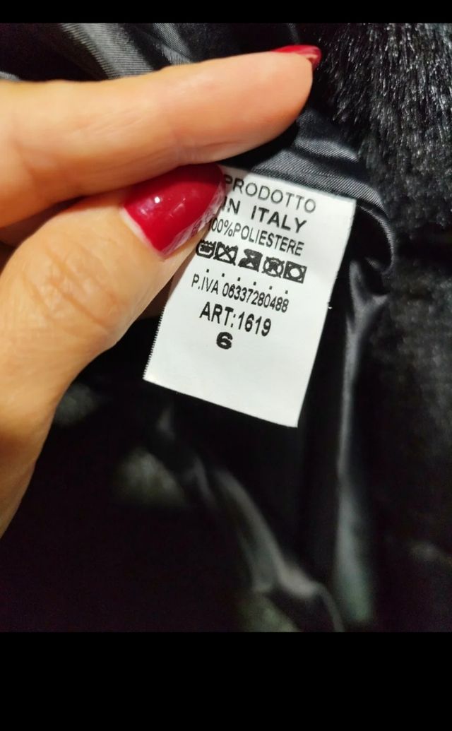 Abrigo de pelo negro