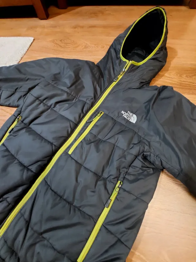 Chaqueta The North Face Primaloft Gris oscura.