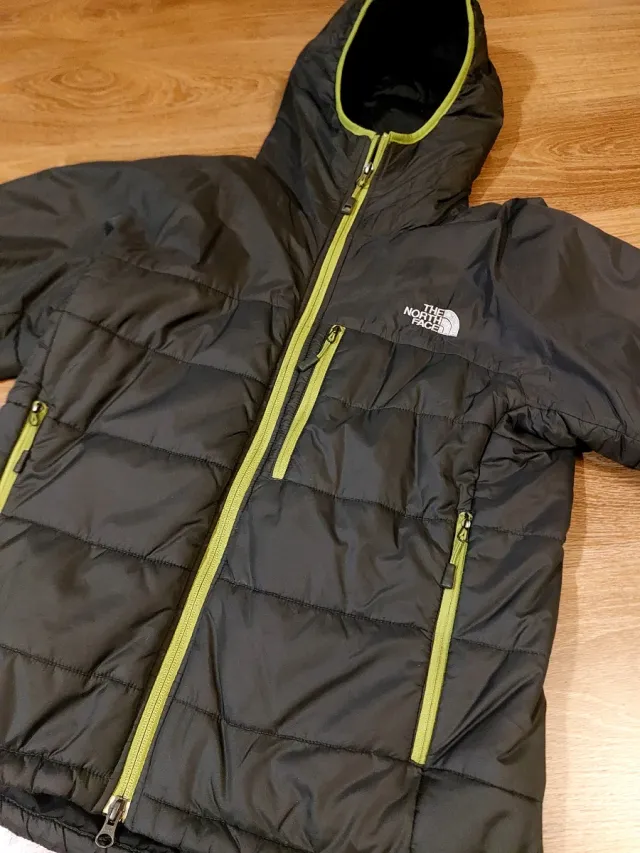 Chaqueta The North Face Primaloft Gris oscura.
