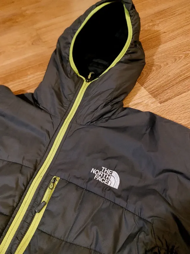 Chaqueta The North Face Primaloft Gris oscura.