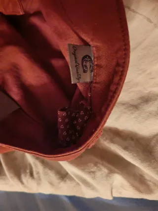 Pantalones vaqueros granates