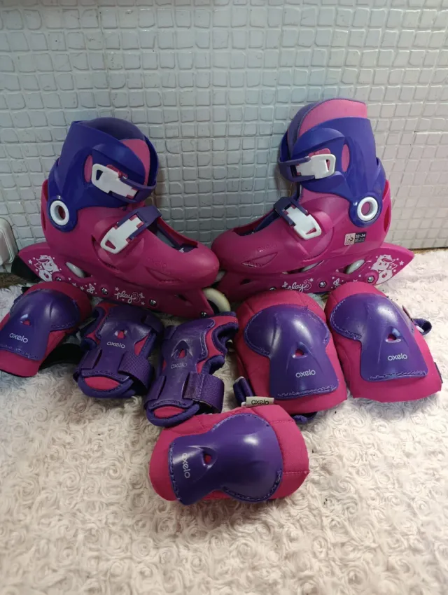 Patines y protecciones Oxelo rosas y morados