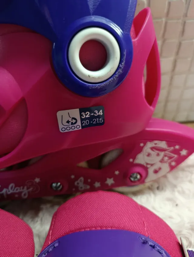 Patines y protecciones Oxelo rosas y morados