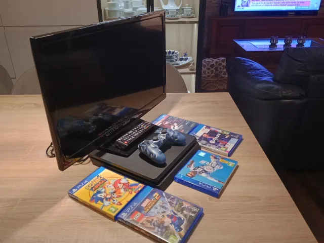 PS4 Negra + Mando + Juegos + Cables