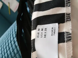 Falda corta cebra con anillas