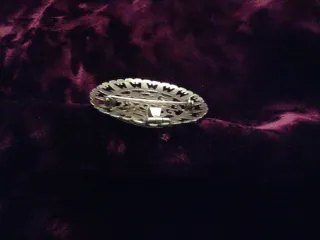 Antiguo broche colgante de plata