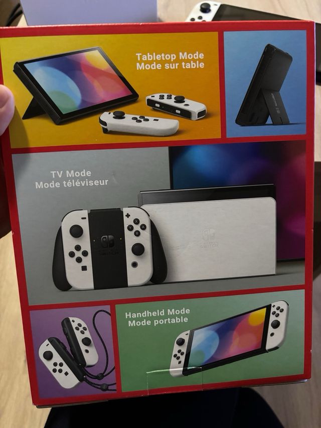 Nintendo Switch OLED + 4 Juegos