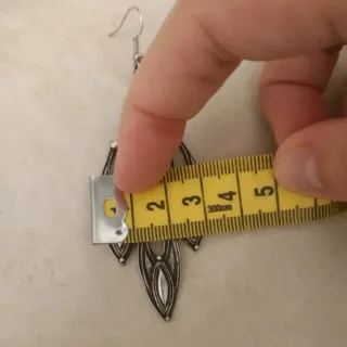 Orecchini pendenti colore argento simil rombo